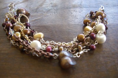 tiarasjewels: Multi-stranded bracelet made with Freshwater Pearls, chain and Swarovski Crystals. For more information please contact me at Tiarasjewels@gmail.com